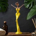 Gelbe Venus Skulptur von NONOS aus Bronze – handgefertigtes Kunstobjekt mit dynamischer Form und moderner Farbgestaltung